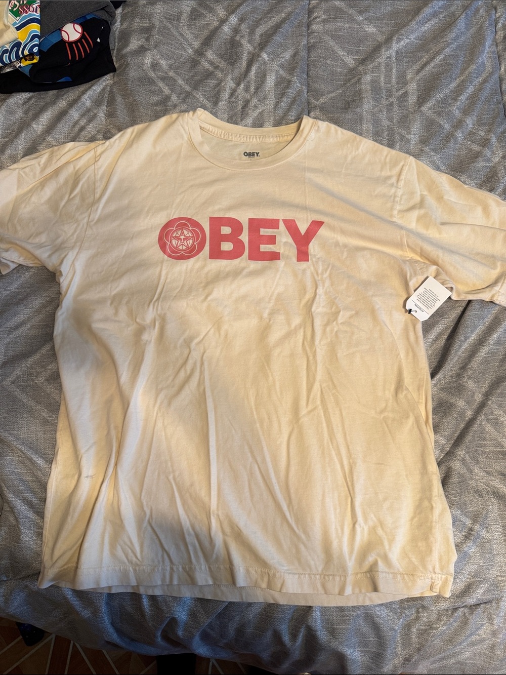Obey Cream Short Sleeve Tee with Pink Logo